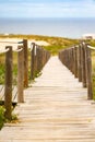 Sandy boardwalk path to the beach