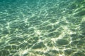 Sandy bottom with sunlight reflections Royalty Free Stock Photo