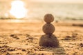 Sandy christmas snowman in red santa hat and sunglasses at sunny beach. Holiday concept for New Years Cards Royalty Free Stock Photo