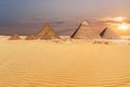 Sandy desert of Giza and beautiful pyramids view Royalty Free Stock Photo