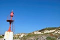 Little lighttower in the dunes of Peniche, Centro - Portugal Royalty Free Stock Photo