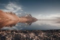 Sandy hills reflected in the lake in Iceland Royalty Free Stock Photo