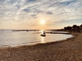 Sandy horisontal beach with boat