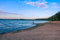 Sandy lakeside under the blue summer sky. Eastern European landscape Royalty Free Stock Photo