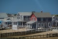 Sandy Neck Lighthouse atlantic ocean cape cod barnstable houses Royalty Free Stock Photo