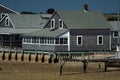 Sandy Neck Lighthouse atlantic ocean cape cod barnstable houses Royalty Free Stock Photo