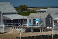 Sandy Neck Lighthouse atlantic ocean cape cod barnstable houses Royalty Free Stock Photo