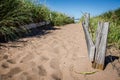 Sandy path and beach grass leads to Park Point Beach in Duluth MN Royalty Free Stock Photo