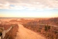 Sandy path leads to beach at Cape May meadows at sunrise on an early spring morning Royalty Free Stock Photo