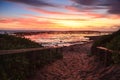 Sandy path to the beach at dawn sunrise Royalty Free Stock Photo