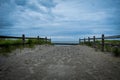 Blue Stormy early morning sky on the path to the beach Royalty Free Stock Photo