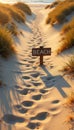 Sandy path to beach sign with footprints at sunset Royalty Free Stock Photo