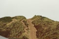 Sandy path up to the dunes over Saunton Sands beach in Devon, South West, UK Royalty Free Stock Photo