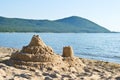 Sandy pyramid on the bank of lake Baikal. Royalty Free Stock Photo