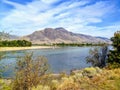 The sandy river bank of the North Thompson river in the beautiful dry landscape of Kamloops, British Columbia, Canada. Royalty Free Stock Photo