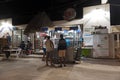 Sandy road with tourists and stalls on holbox island, quintana r