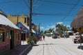 Sandy road with tourists and stalls on Holbox Island, Quintana Roo, Mexico located in north yucatan peninsula