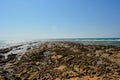 Sandy and rocky beach of the red sea in Egypt South Sinai at the daylight in summer, Natural panoramic empty shore with no people