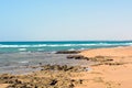 Sandy and rocky beach of the red sea in Egypt South Sinai at the daylight in summer, Natural panoramic empty shore with no people