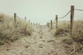 A Sandy and Roped Pathway leads to the Beach