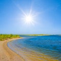 sandy sea beach at the summer sunny day