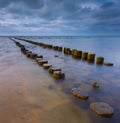 Sandy shore of Baltic sea and torpedownia near Gdynia.