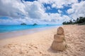 sandy woman on Lanikai Beach and Mokulua Islands, O'ahu, Hawai'i