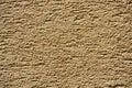 Sandy-yellow stucco texture