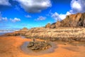 Sandymouth beach North Cornwall England UK beautiful rocks with unusual patterns in colourful HDR