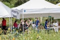 Social distance practiced as people enter information booth at the Sussex County Sunflower Maze