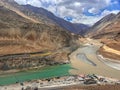 Sangam Point - Two color river - Confluence of the Indus and Zanskar at Leh Ladakh, India Royalty Free Stock Photo