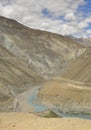 Sangam of the Zanskar and Indus rivers flowing through dry mountains in Nimmu Valley