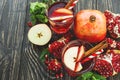 Sangria with apples, pomegranate, mint and cinnamon