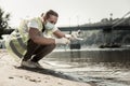 Sanitary inspector holding test tubes while checking water contamination level Royalty Free Stock Photo