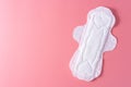 Sanitary pad, Sanitary napkin on pink background. Menstruation, Feminine hygiene, top view Royalty Free Stock Photo