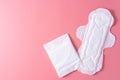 Sanitary pad, Sanitary napkin on pink background. Menstruation, Feminine hygiene, top view Royalty Free Stock Photo