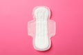 Sanitary pad on pink background