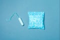 Sanitary pad and tampon on blue, menstruation products