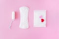 Sanitary swab and pads on a pink background. Royalty Free Stock Photo