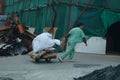 Sanitation workers dragged garbage