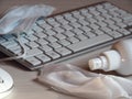 Keyboard, sanitizers and face mask