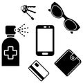 Sanitizer spray for disinfecting phone, wallet, keys, credit card, sunglasses. Sanitizing personal mobile, wallet and keys used Royalty Free Stock Photo