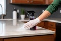 sanitizing spray on a granite countertop