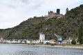 Sankt Goarshausen, Germany - 09 30 2021: waterfront of Sankt Goarshausen with Burg Katz and te harbor crane
