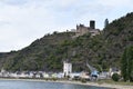 Sankt Goarshausen, Germany - 09 30 2021: waterfront of Sankt Goarshausen with Burg Katz and the harbor crane