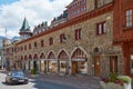 Serlas street with luxury stores, people and car in a sunny summer day in Sankt Moritz