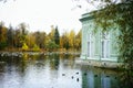 Sankt-Petersburg building exterior architecture outdoors lake autumn park trees birds reflection sky