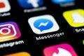 Facebook messenger application icon on Apple iPhone X screen close-up. Facebook messenger app icon. Online internet social media n Royalty Free Stock Photo