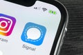 Signal messenger application icon on Apple iPhone X smartphone screen close-up. Signal messenger app icon. Social media network.