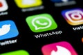 Whatsapp messenger application icon on Apple iPhone X smartphone screen close-up. Whatsapp messenger app icon. Social media icon.